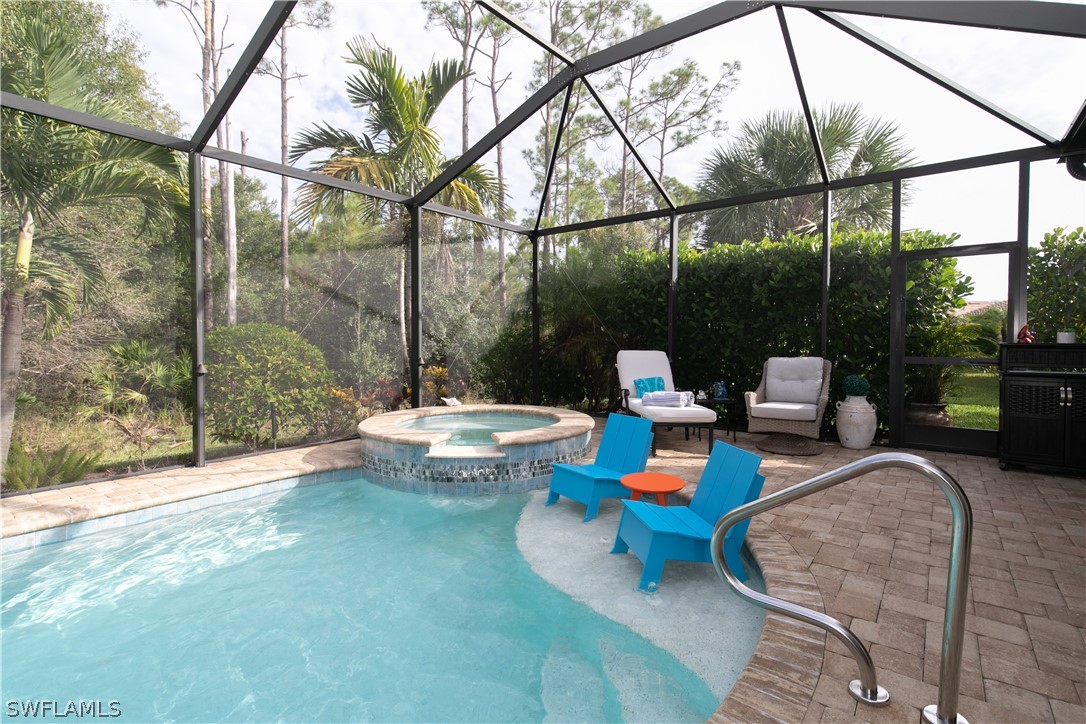 10832 Dennington Road Fort Myers, FL 33913 - Photo 26 of 34 a view of swimming pool with a patio