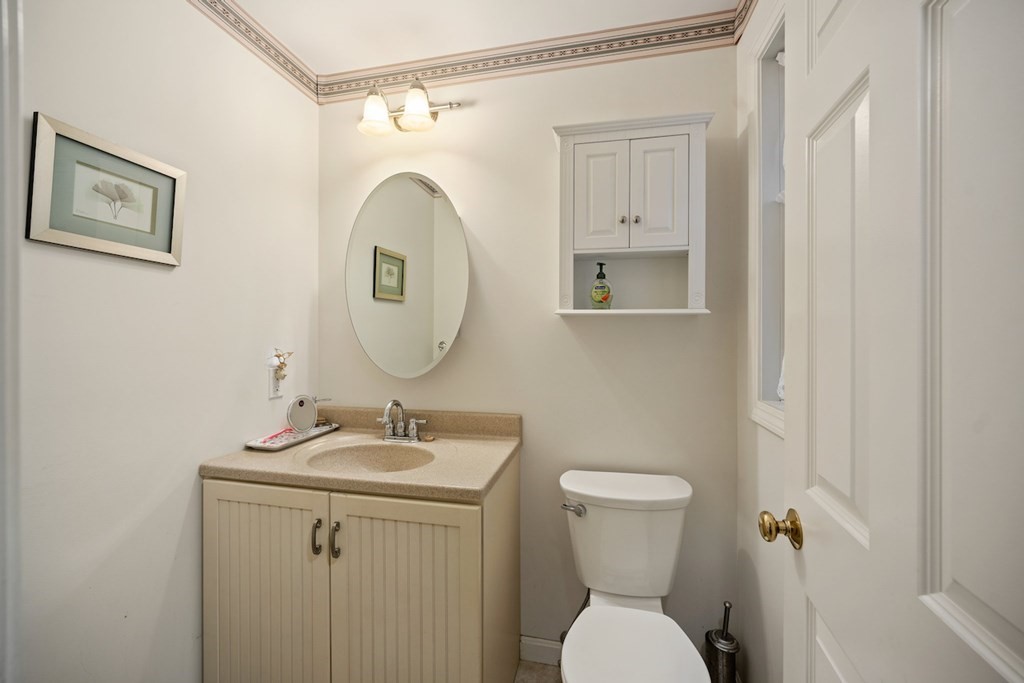 90 Greenwich Road Ware, MA 01082 - Photo 16 of 41 a bathroom with a toilet sink and mirror