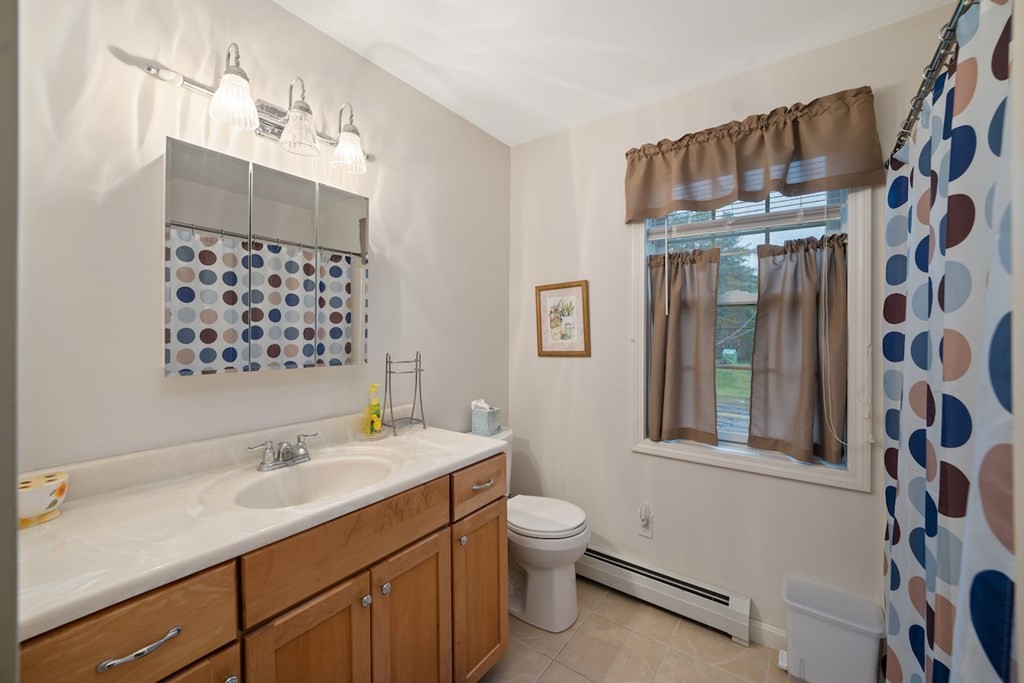 90 Greenwich Road Ware, MA 01082 - Photo 25 of 41 a bathroom with a sink toilet and shower