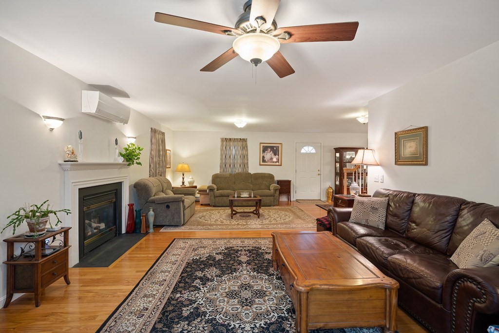 90 Greenwich Road Ware, MA 01082 - Photo 3 of 41 a living room with furniture fireplace and window