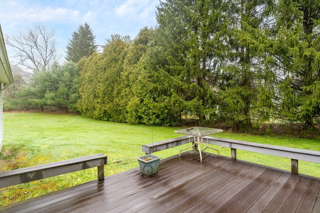 90 Greenwich Road Ware, MA 01082 - Photo 39 of 41 a wooden bench sitting on top of a wooden floor