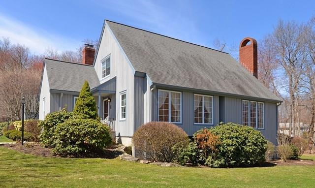 152 Glengarry Road, Unit 152 Fairfield, CT 06825 - Photo 1 of 1 a front view of a house with garden