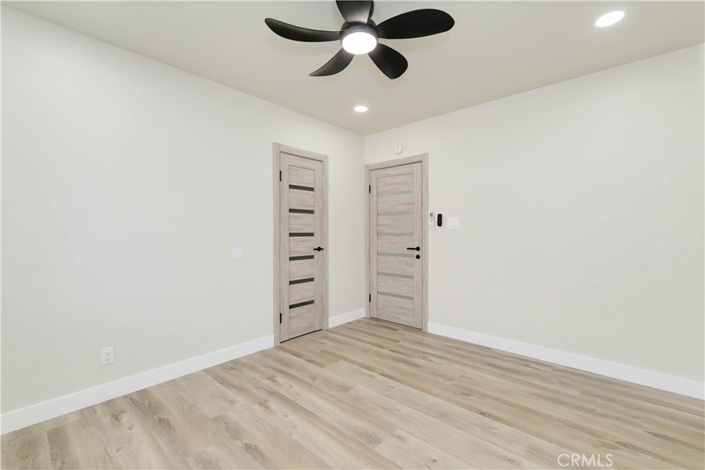 604 South Burris Avenue Compton, CA 90221 - Photo 17 of 25 a view of empty room with wooden floor