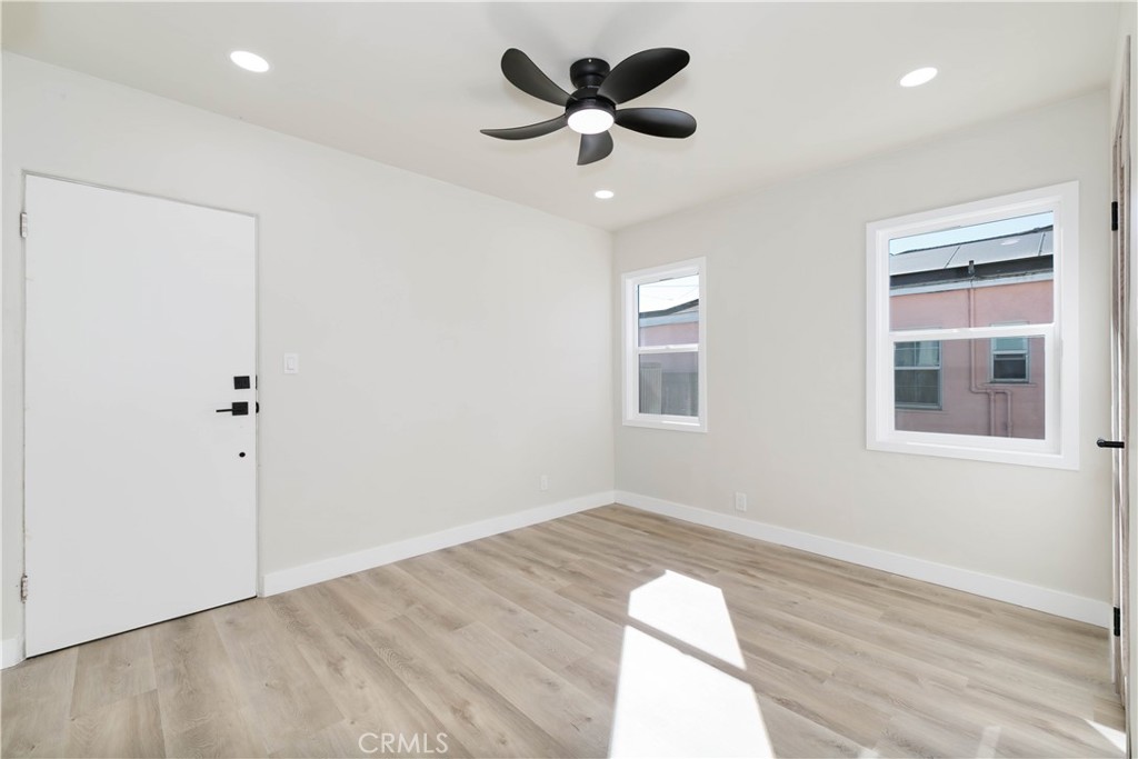604 South Burris Avenue Compton, CA 90221 - Photo 18 of 25 a view of an empty room with a window