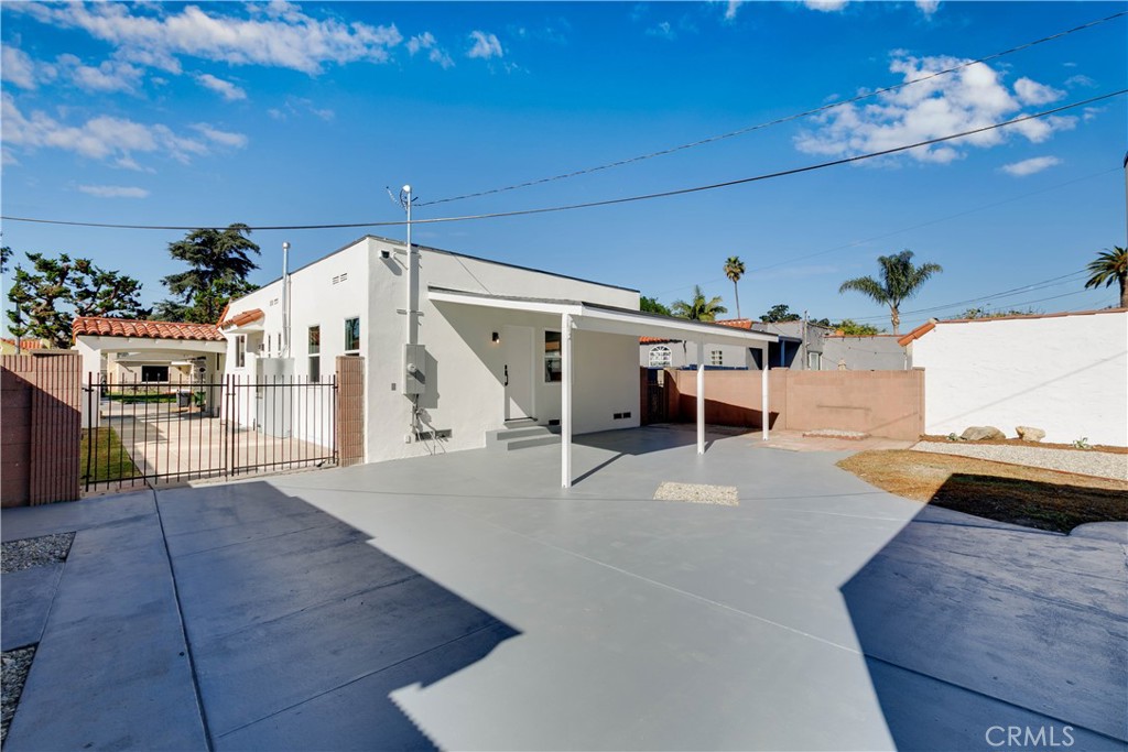 604 South Burris Avenue Compton, CA 90221 - Photo 23 of 25 a view of a livingroom with furniture and a flat screen tv