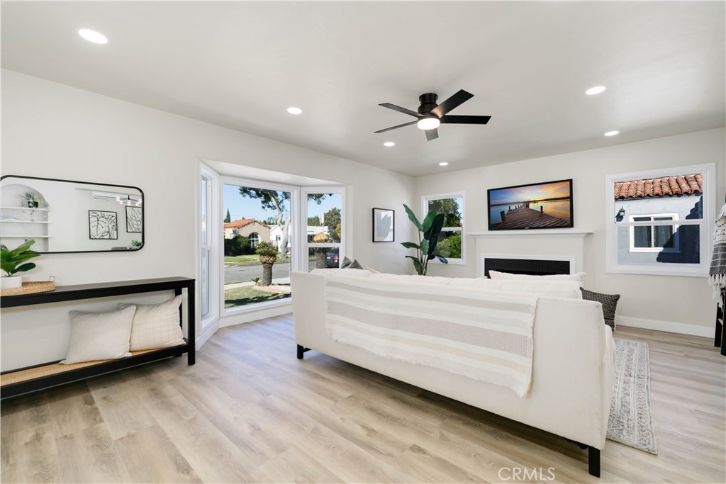 604 South Burris Avenue Compton, CA 90221 - Photo 4 of 25 a living room with furniture and a flat screen tv