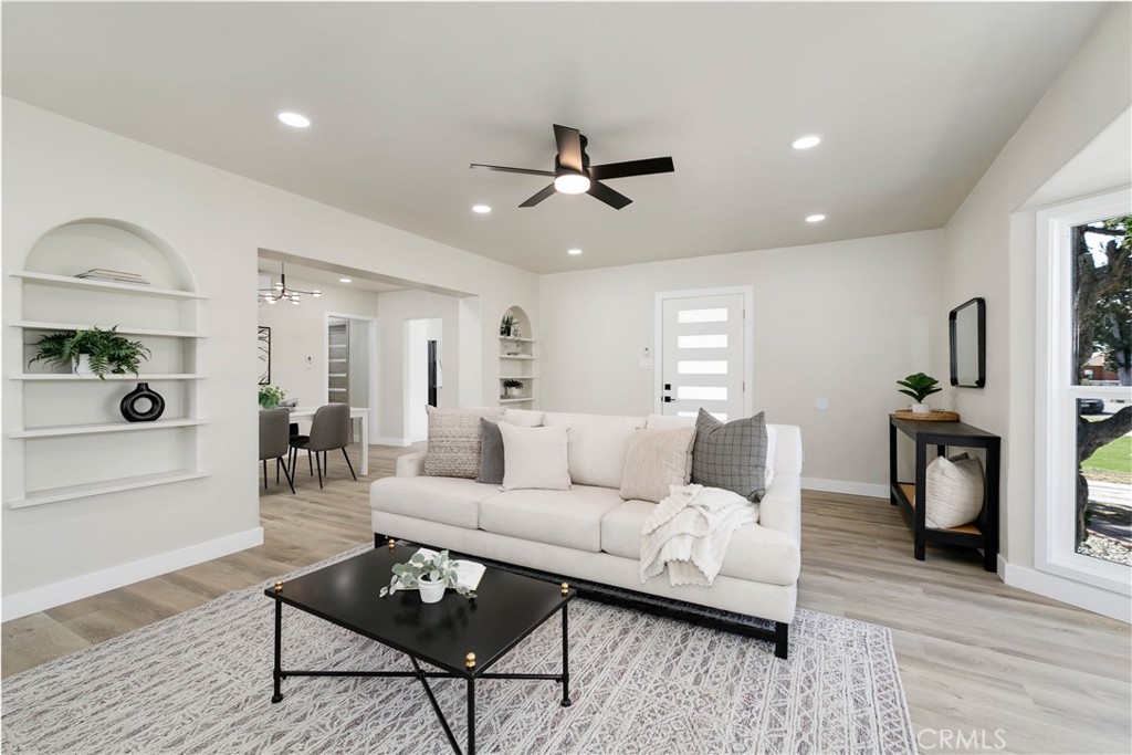604 South Burris Avenue Compton, CA 90221 - Photo 6 of 25 a living room with furniture and wooden floor