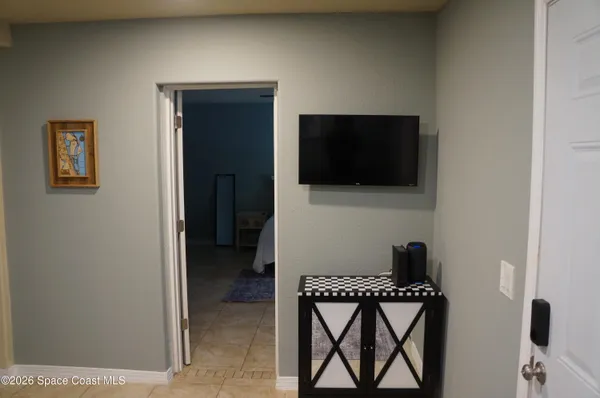 a view of a livingroom with a flat screen tv