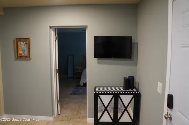 a view of a livingroom with a flat screen tv