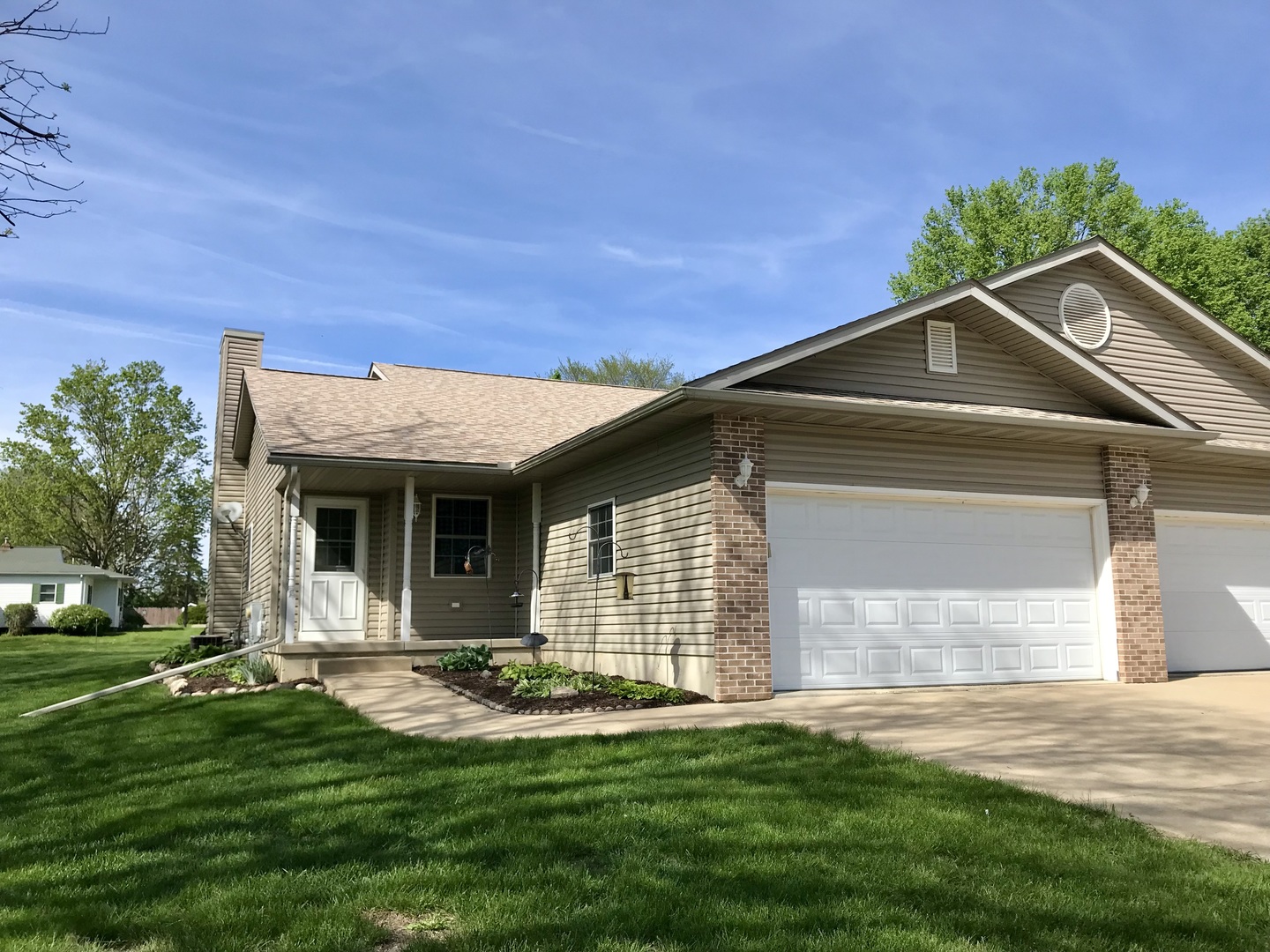 307 West Hudson Street Princeton, IL 61356 - Photo 1 of 23 a front view of a house with a yard and garage