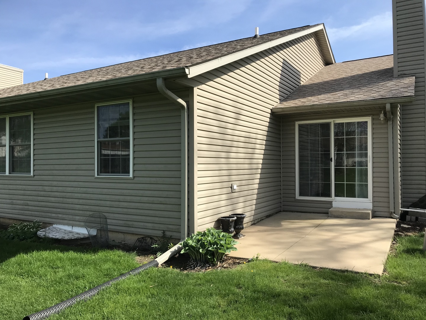 307 West Hudson Street Princeton, IL 61356 - Photo 2 of 23 a front view of a house with a yard and garage