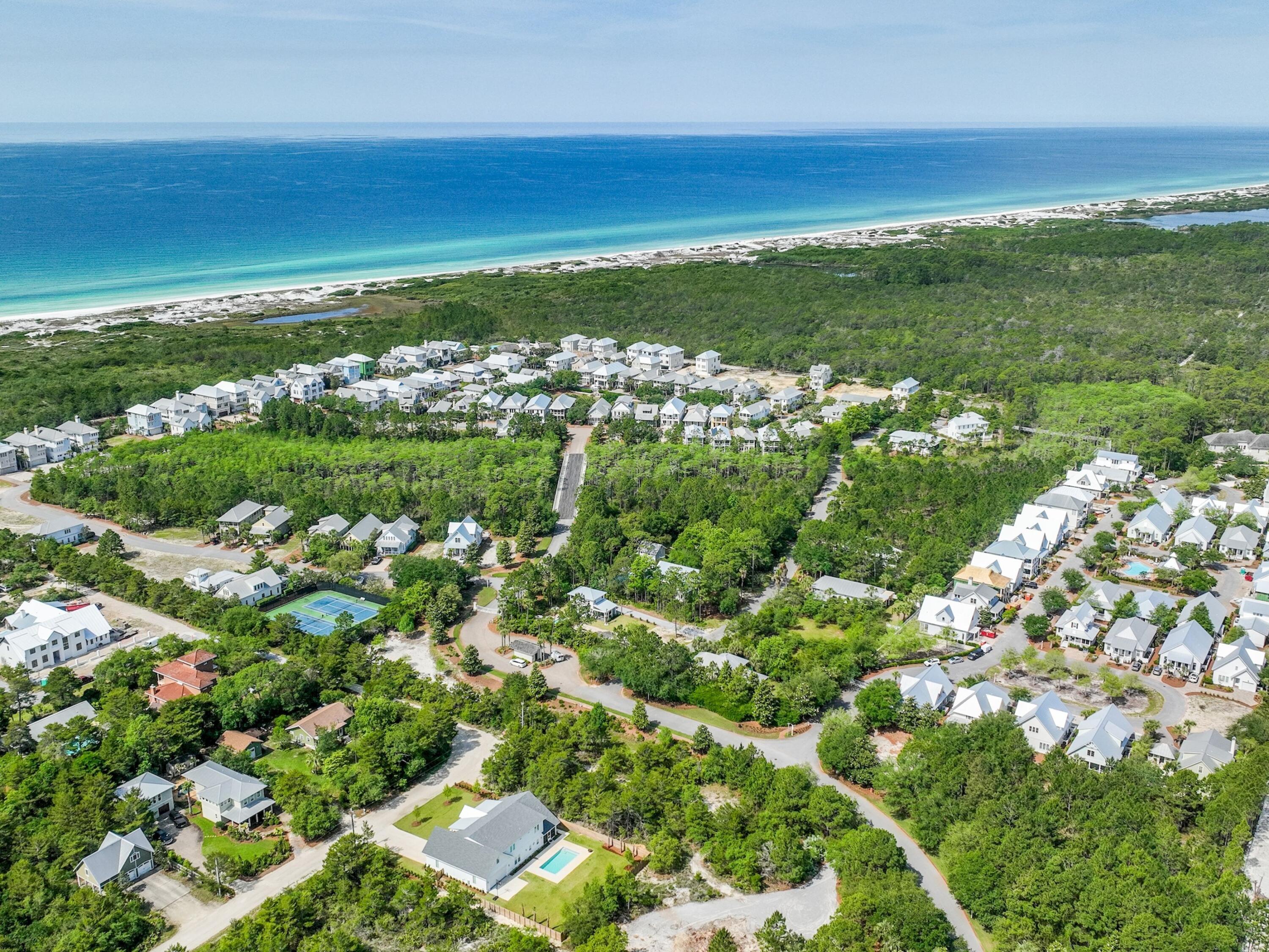 Lot 162 Gulf Walk Santa Rosa Beach, FL 32459 - Photo 3 of 48 an aerial view of residential houses with outdoor space and trees