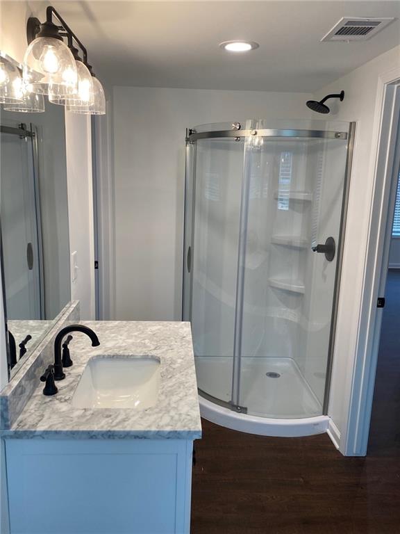 5919 River Road Flowery Branch, GA 30542 - Photo 17 of 18 a bathroom with a sink shower and a mirror