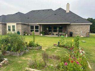 2321 Kimberly Lane Midlothian, TX 76065 - Photo 2 of 10 a view of house with garden and yard