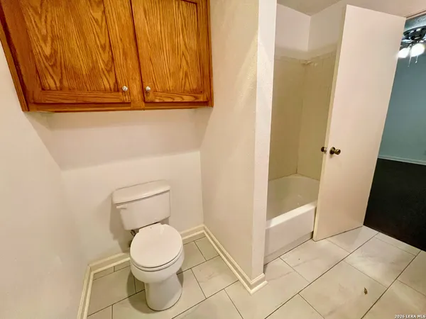 a bathroom with a toilet