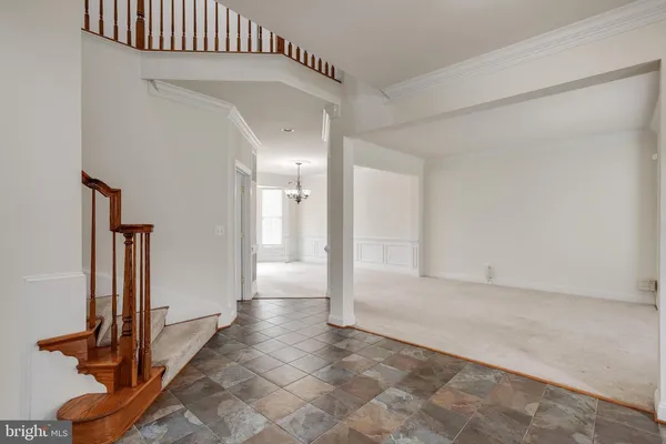 a view of a livingroom with a staircase