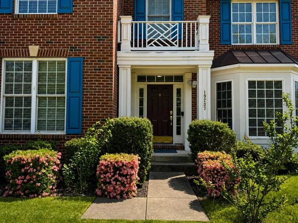 a view of a house with a garden