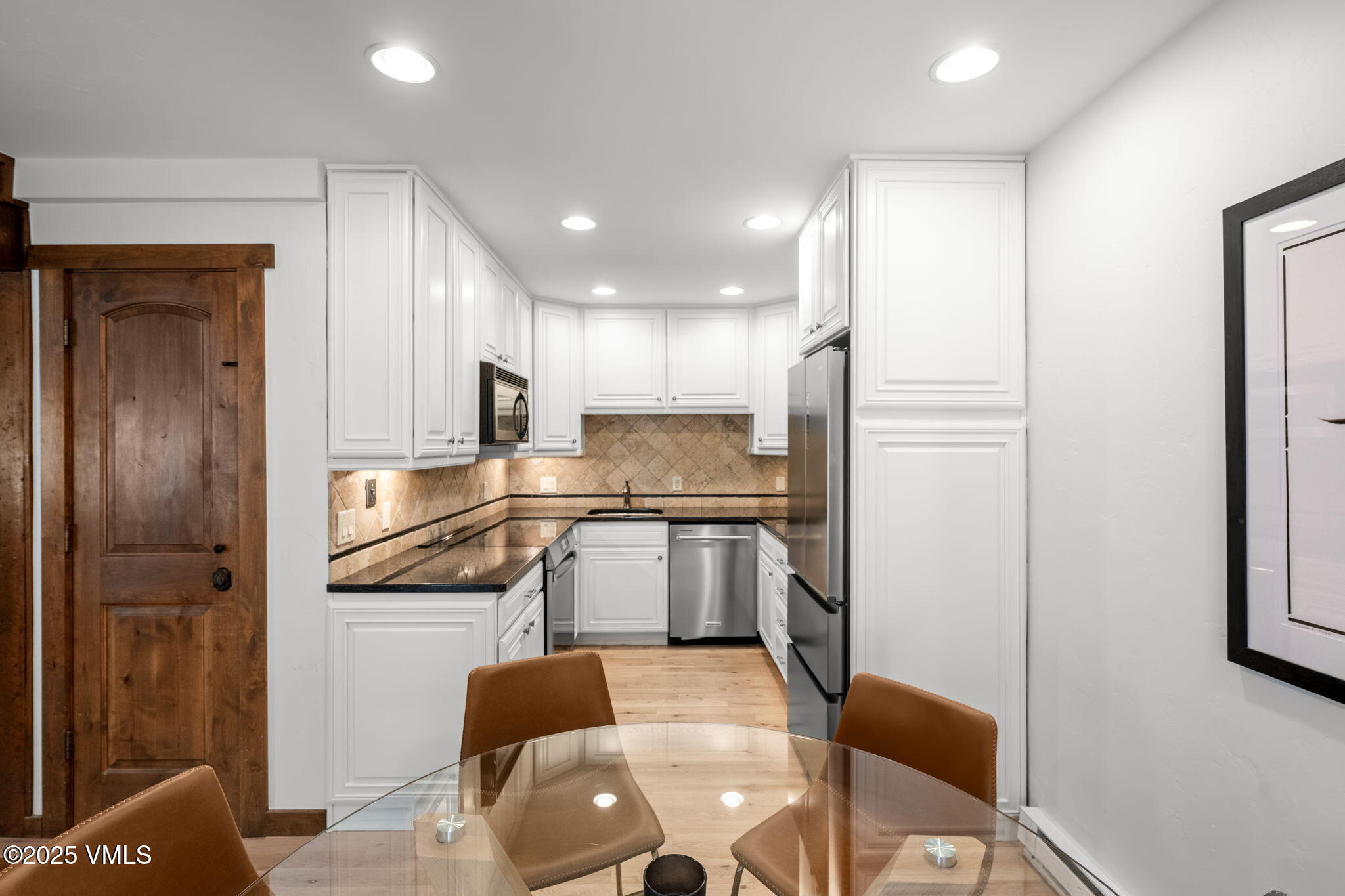 4770 Big Horn Road, Unit B4 Vail, CO 81657 - Photo 11 of 47 a kitchen with a refrigerator and a sink