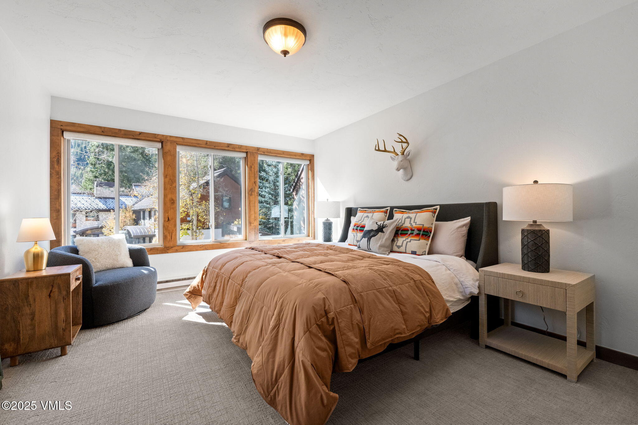 4770 Big Horn Road, Unit B4 Vail, CO 81657 - Photo 13 of 47 a bedroom with a bed and a couch