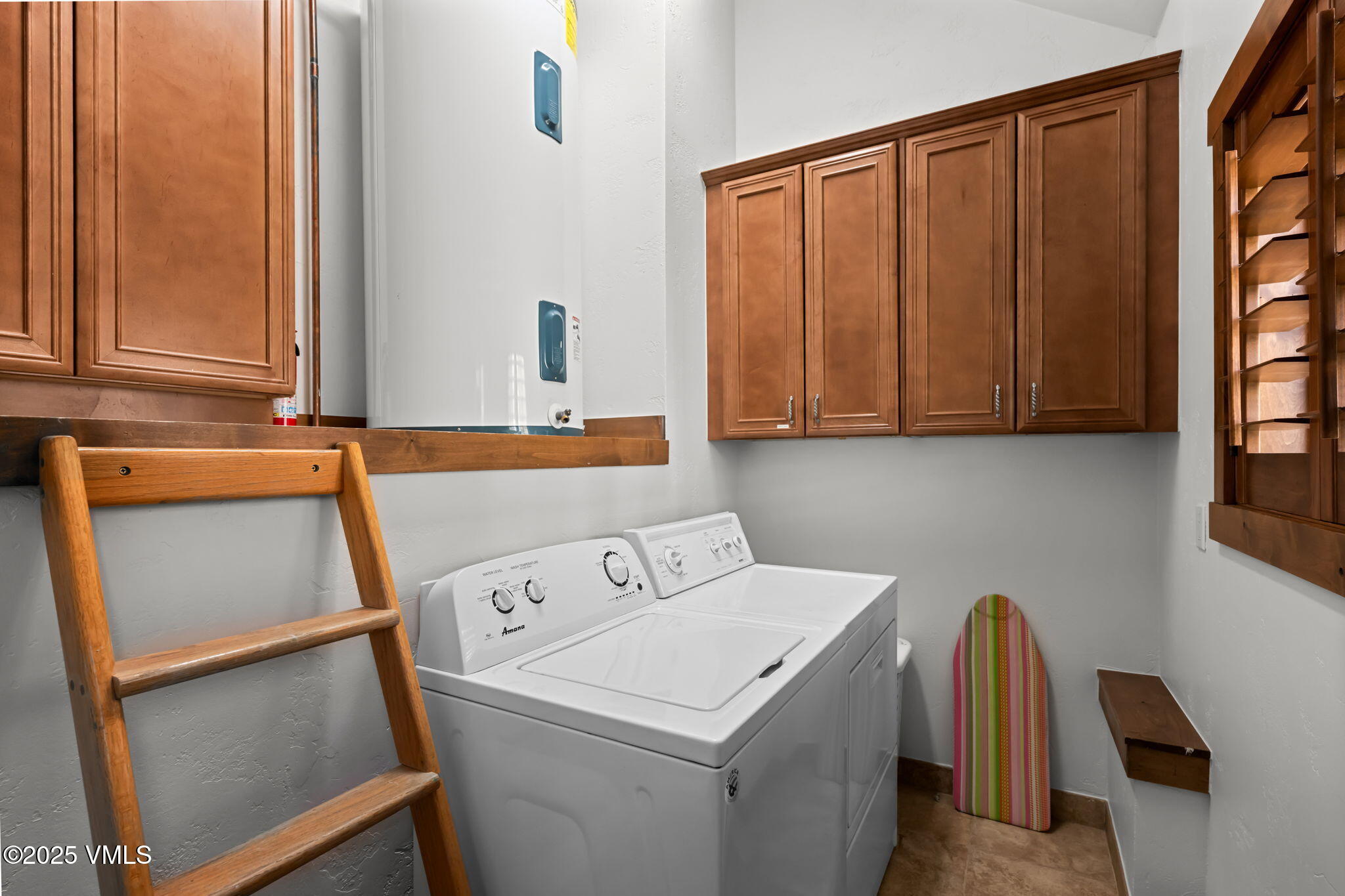 4770 Big Horn Road, Unit B4 Vail, CO 81657 - Photo 20 of 47 a utility room with dryer and washer