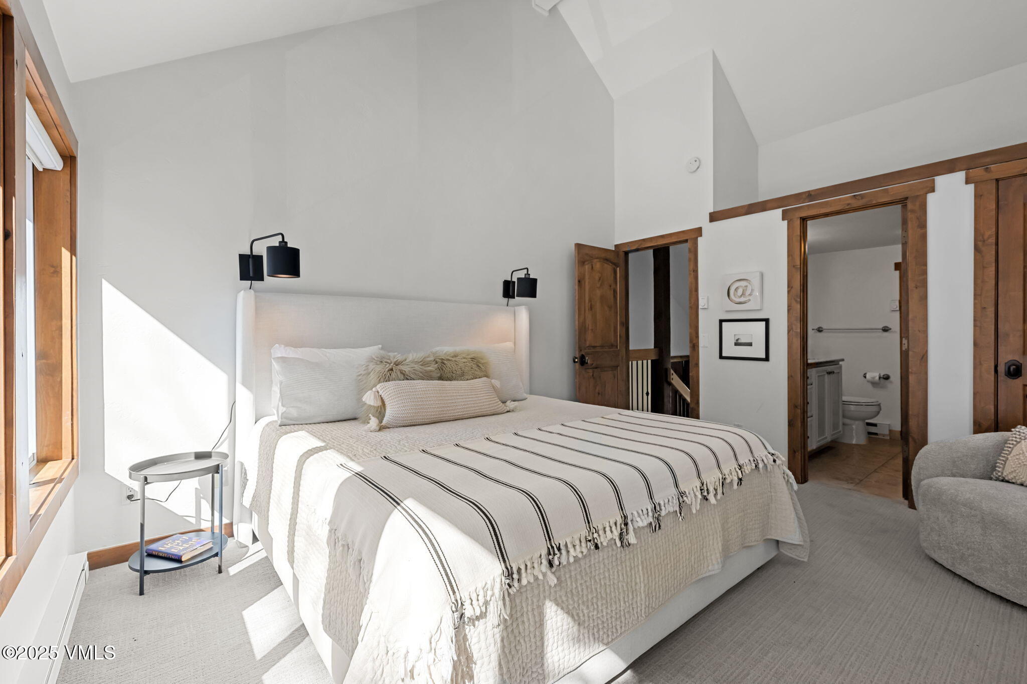 4770 Big Horn Road, Unit B4 Vail, CO 81657 - Photo 23 of 47 a bedroom with a bed and a refrigerator