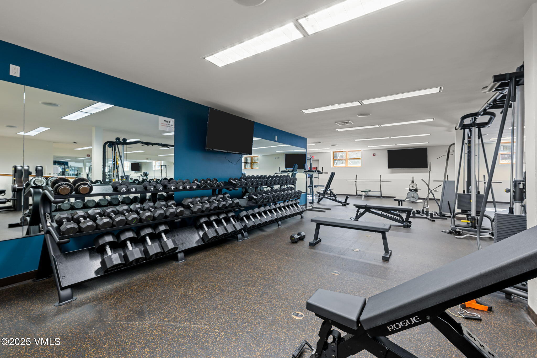 4770 Big Horn Road, Unit B4 Vail, CO 81657 - Photo 35 of 47 a living room with lots of furniture and a wooden floor