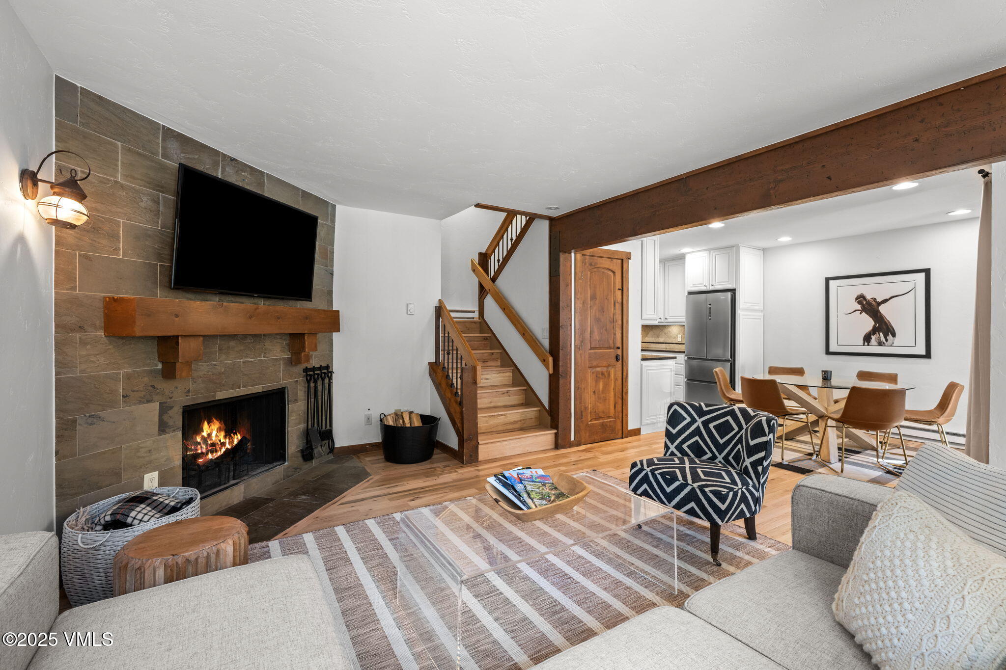 4770 Big Horn Road, Unit B4 Vail, CO 81657 - Photo 8 of 47 a living room with furniture and a fireplace