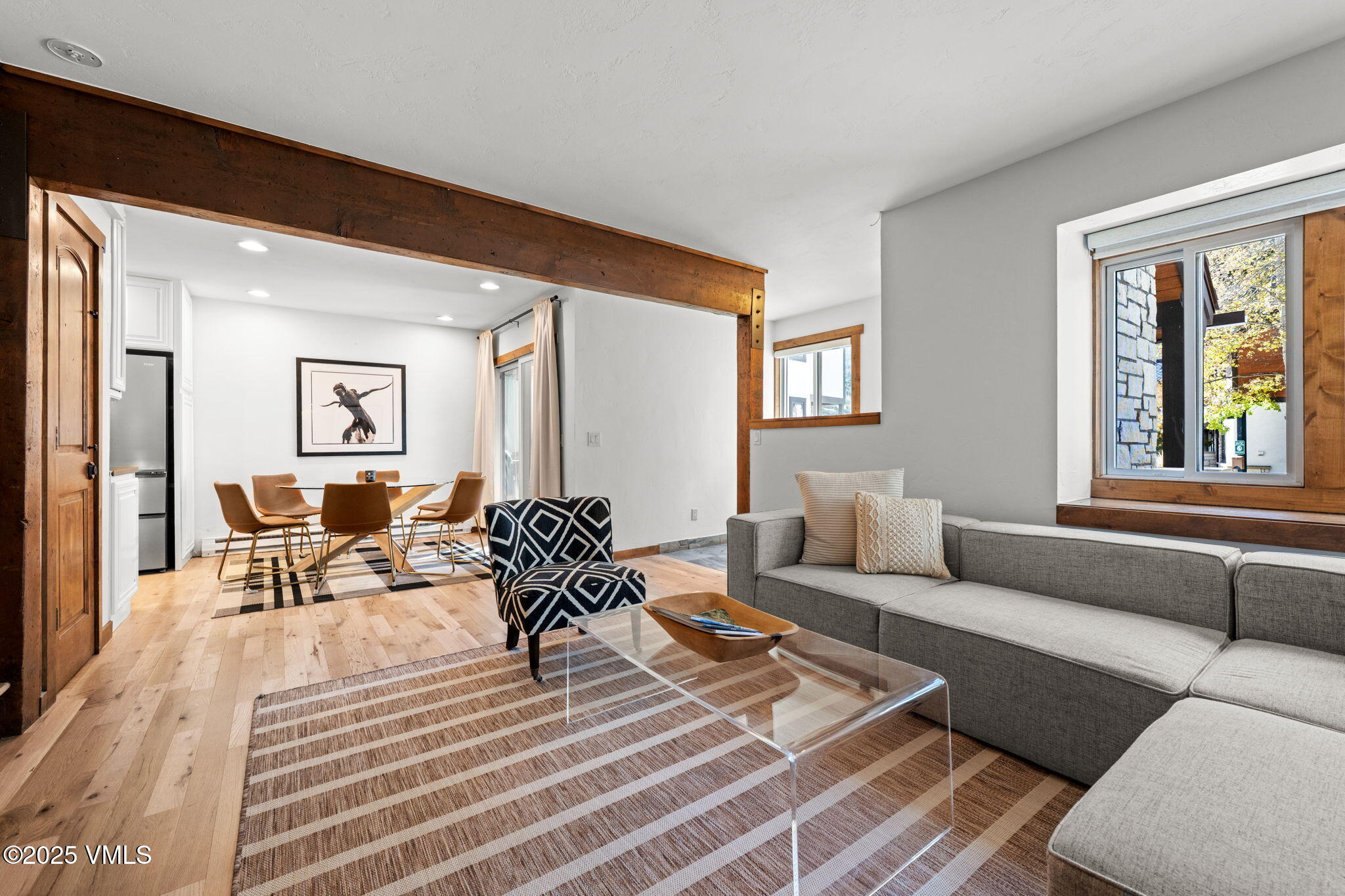 4770 Big Horn Road, Unit B4 Vail, CO 81657 - Photo 9 of 47 a living room with furniture and wooden floor