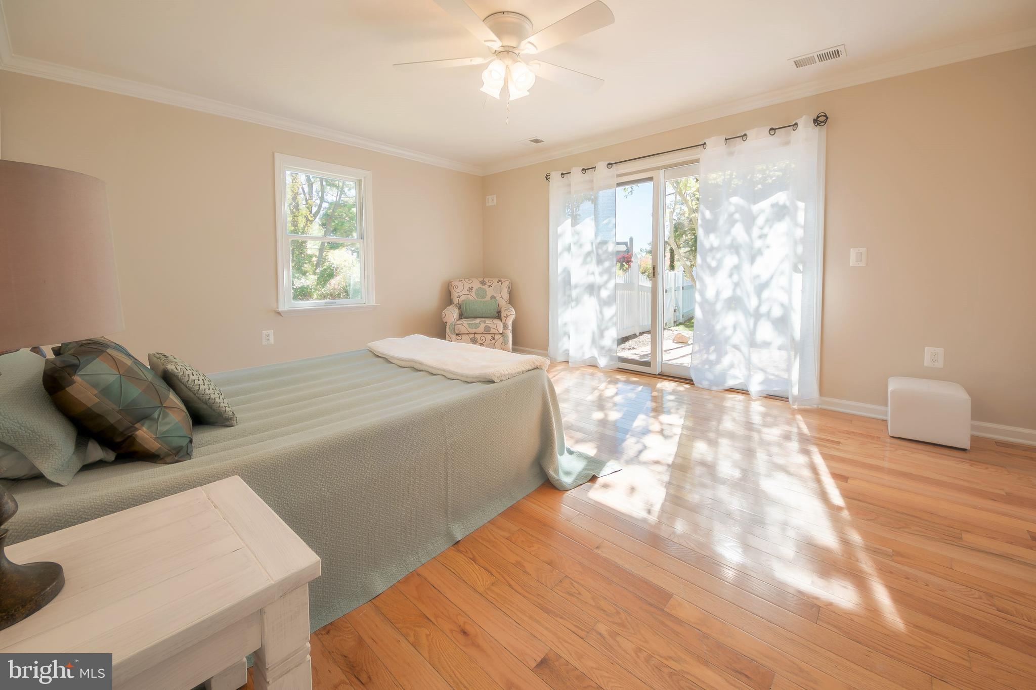 104 River Run Queenstown, MD 21658 - Photo 42 of 58 2nd Master suite w/sliders to patio.