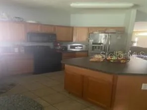 a view of storage and utility room with washer and dryer