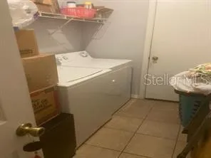 a view of a livingroom with furniture