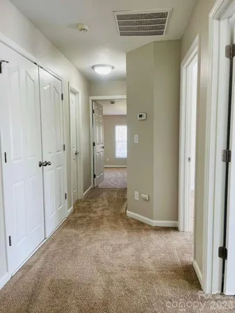 a view of a bathroom with a shower and a sink
