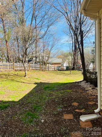 a view of a swimming pool with an outdoor space and seating area