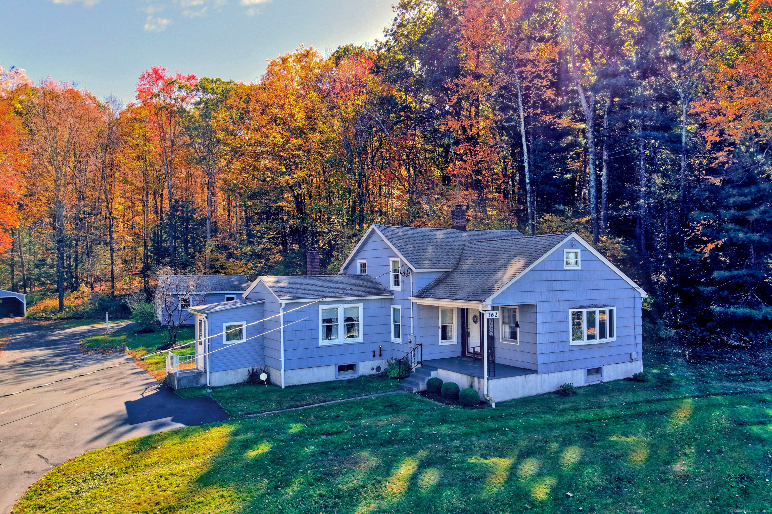 362 Hill Road Thomaston, CT 06787 - Photo 1 of 1 a front view of a house with garden