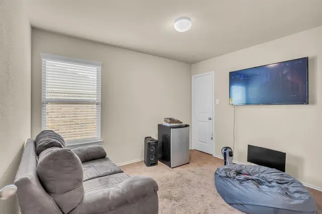 a bathroom with a sink toilet and mirror