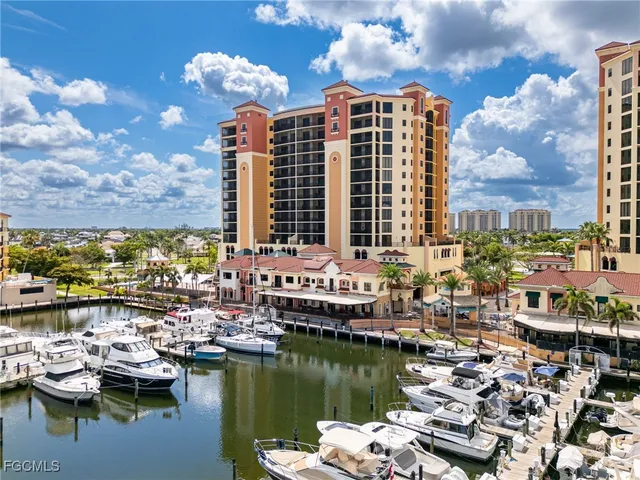 a view of a lake with tall buildings