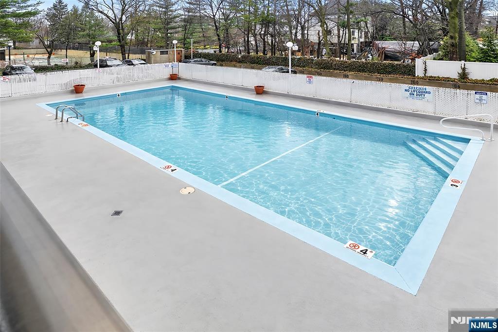 277 Prospect Avenue, Unit 14B Hackensack, NJ 07601 - Photo 21 of 23 a view of a swimming pool