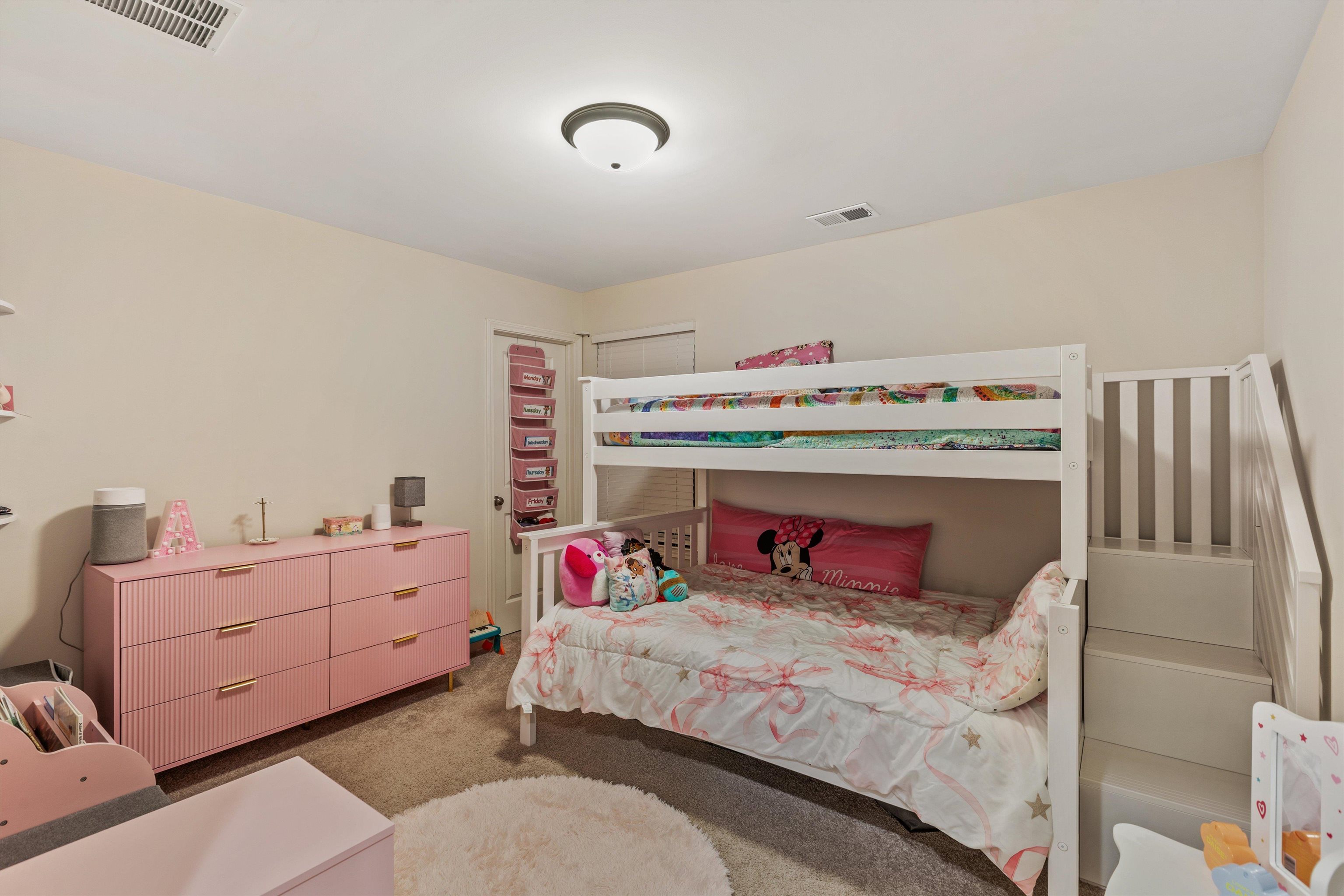 10139 Macon Road Cordova, TN 38018 - Photo 23 of 31 Carpeted bedroom featuring neutral wall tones, a white ceiling light fixture, and a built-in closet with a white door