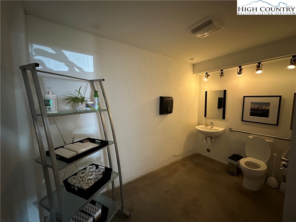 164 Depot Street Boone, NC 28607 - Photo 14 of 24 a room with furniture and wooden floor