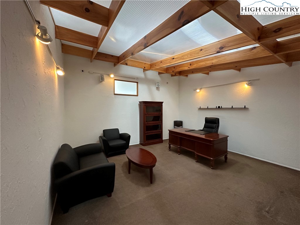 164 Depot Street Boone, NC 28607 - Photo 17 of 24 a living room with furniture and a fireplace