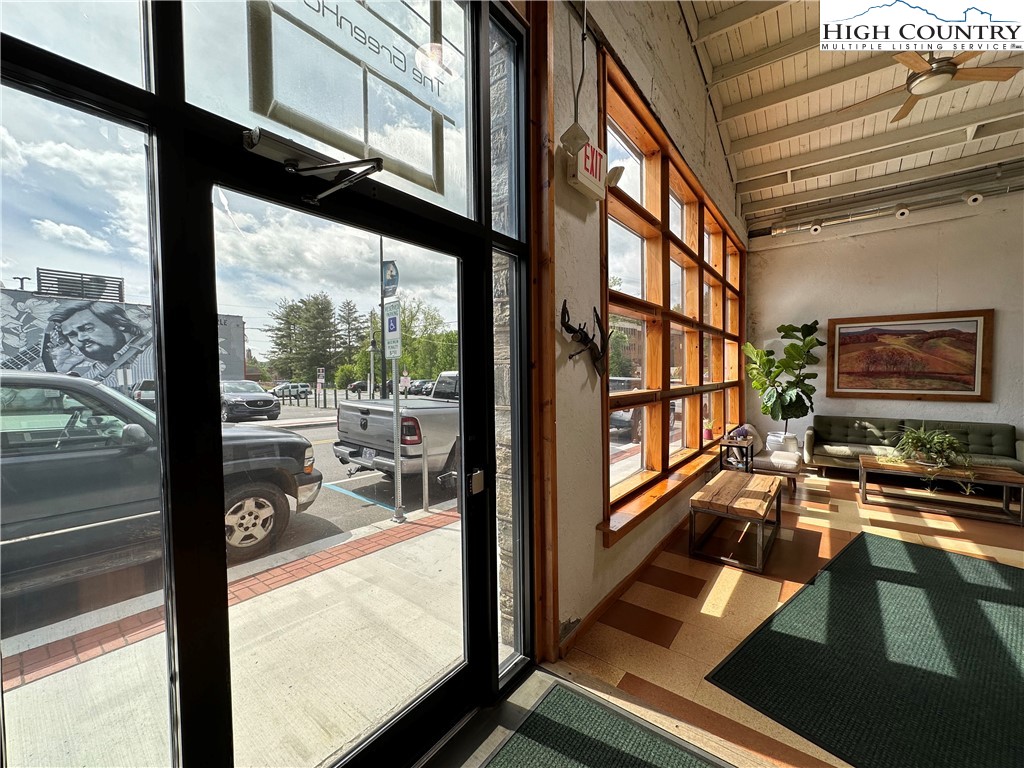 164 Depot Street Boone, NC 28607 - Photo 7 of 24 a view of a living room with a large window
