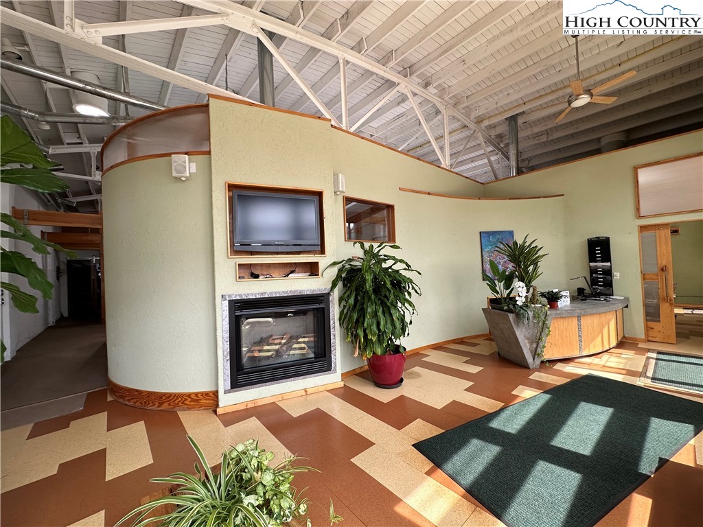 164 Depot Street Boone, NC 28607 - Photo 8 of 24 a view of a livingroom with furniture and a flat screen tv