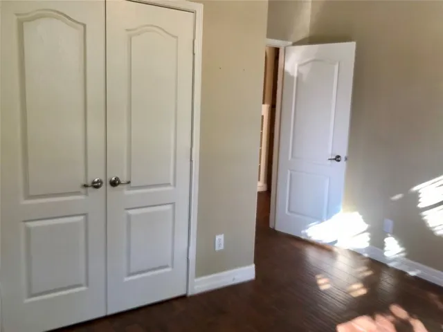a view of a livingroom with wooden floor