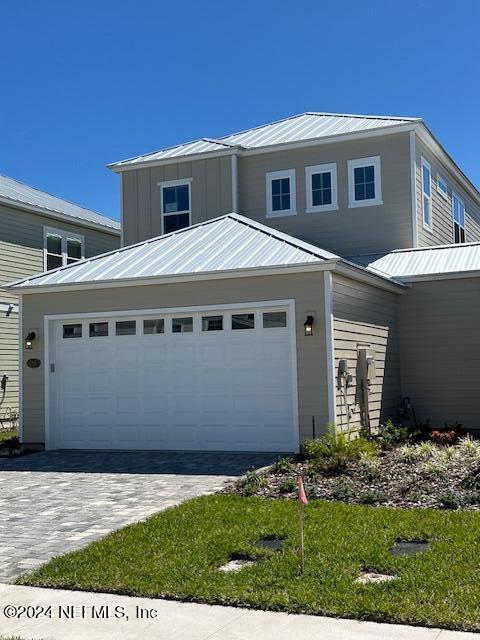 385 Rum Runner Way, Unit 49 St. Johns, FL 32259 - Photo 1 of 34 a front view of a house with a yard
