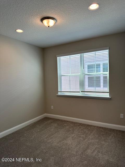 385 Rum Runner Way, Unit 49 St. Johns, FL 32259 - Photo 11 of 34 an empty room with a window