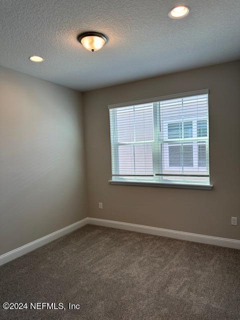 385 Rum Runner Way, Unit 49 St. Johns, FL 32259 - Photo 12 of 34 an empty room with a window