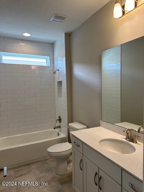 385 Rum Runner Way, Unit 49 St. Johns, FL 32259 - Photo 13 of 34 a bathroom with a granite countertop sink a toilet a mirror and shower