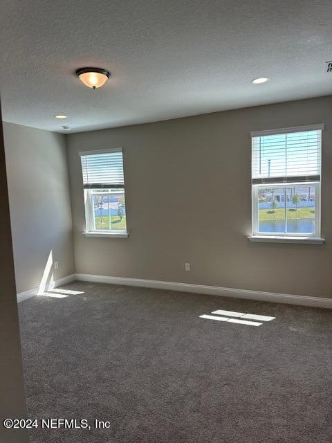 385 Rum Runner Way, Unit 49 St. Johns, FL 32259 - Photo 14 of 34 an empty room with windows