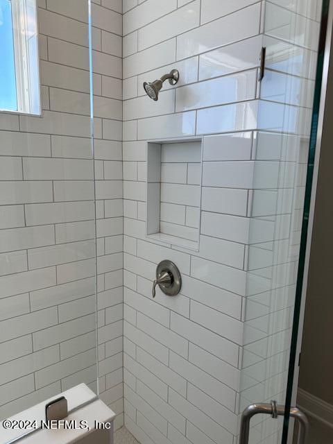 385 Rum Runner Way, Unit 49 St. Johns, FL 32259 - Photo 17 of 34 a bathroom with a shower