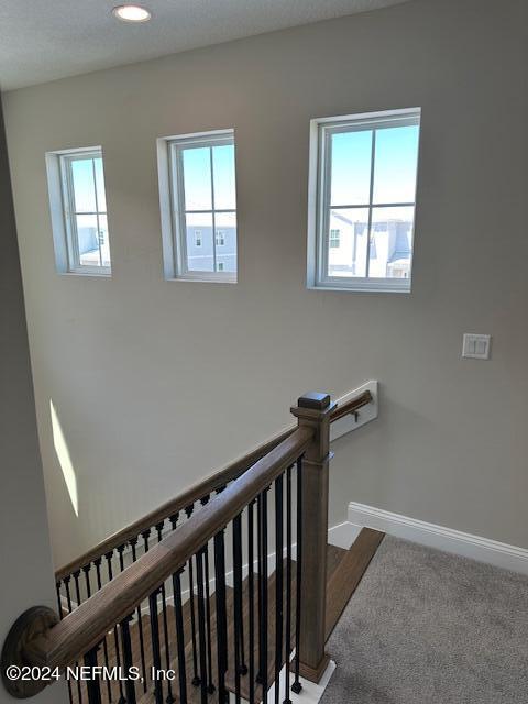 385 Rum Runner Way, Unit 49 St. Johns, FL 32259 - Photo 18 of 34 a view of entryway and hall with wooden floor